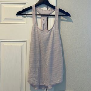 Lululemon Size 4 racer back tee! Perfect for any workout - super light and airy!